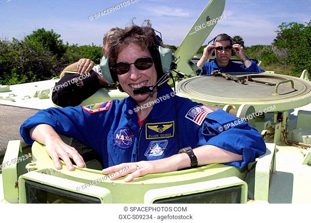 03/18/2002 -- STS-110 Mission Specialist Ellen Ochoa waits her turn at driving the M-113 armored personnel carrier, part of Terminal Countdown Demonstration...