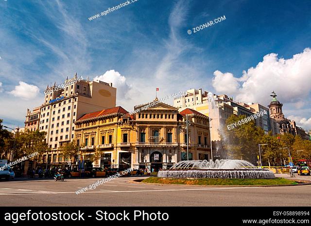 Barcelona, Spain - September 19, 2014: Fountain on the Passeig de Gracia. This street is one of the major avenues in the city. Barcelona, Spain