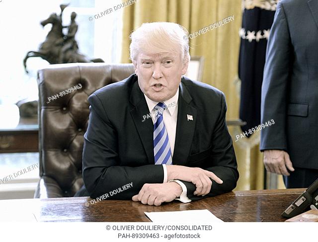 United States President Donald J. Trump reacts after Republicans abruptly pulled their health care bill from the House floor on Friday in the Oval Office of the...