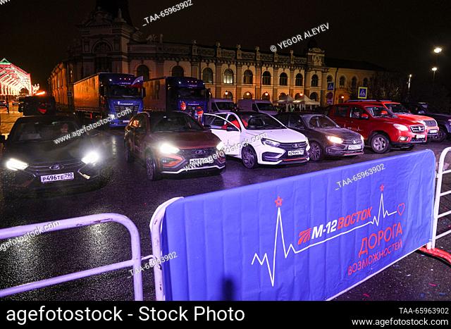 RUSSIA, KAZAN - DECEMBER 21, 2023: A motor race prepares to start from the Kazan Kremlin and mark the opening of the M12 Vostok Highway that links Moscow with...