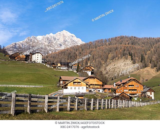 Cluster of traditional farm houses called Viles in the hamlets of Mischi und Seres, village of Campill in the Gader Valley in the Dolomites