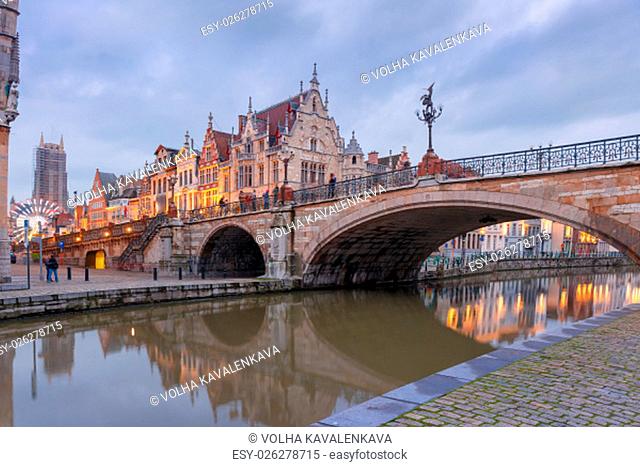 Picturesque medieval building and St. Michael&#39;s Bridge in the evening in Ghent, Belgium