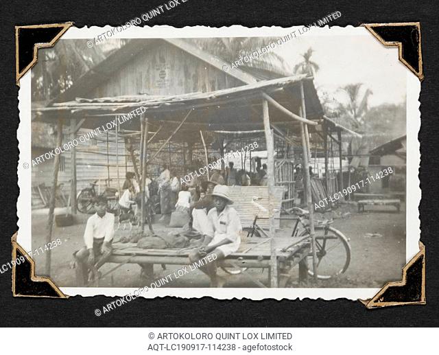 Photograph - 'Native Village Inland, Sumatra', Dutch East Indies, 1942, Black and white photograph of a village and people
