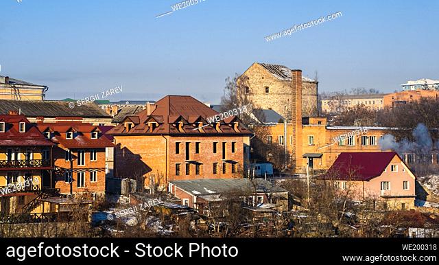 Kamianets-Podilskyi, Ukraine 01. 07. 2020. Historical Buildings on the old street of Kamianets-Podilskyi old town quarter on a sunny winter morning