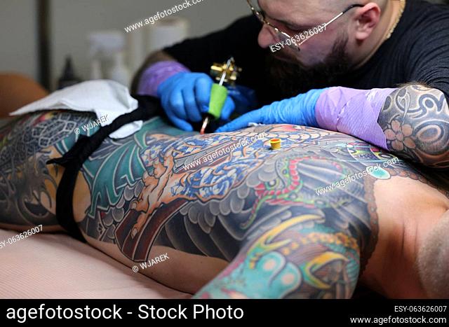 Krakow, Poland - June 12, 2022: Unidentified participant at 15th Tattoofest Convention in Cracow. One of the most prestigious tattoo festivals