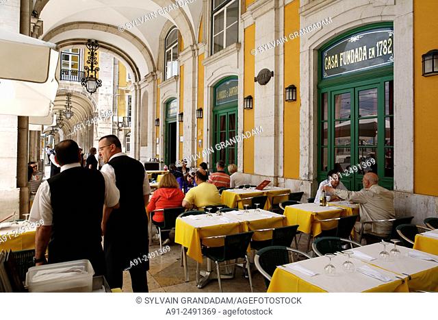 Portugal, Lisbon, on commercio square the cafe Da Martinho established in 1782 and where writer Pessoa had his table