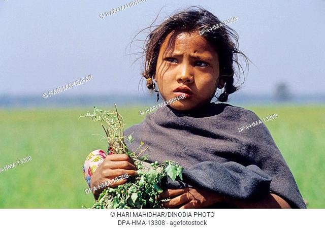 Tribal Girl from Tharu Village, Dudwa, Uttar Pradesh, India