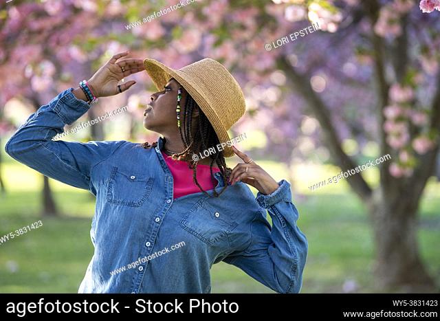 A Black teenage girl poses for the camera