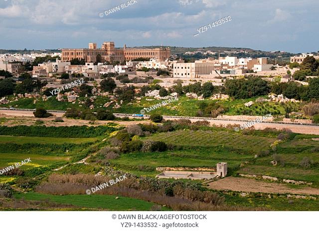 View of the Naval Hospital in Mtarfa from the bastion on Pjazza Tas-Sur, Mdina, Malta  A hospital during WWII the building now houses a secondary school