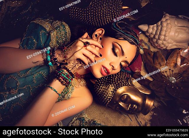 beautiful arabic style bride in ethnic clothes. studio shot. copy space