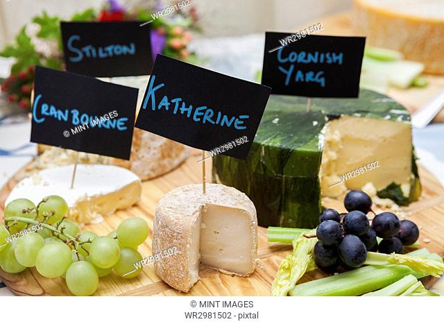 Close up of cheese board with a selection of English cheeses