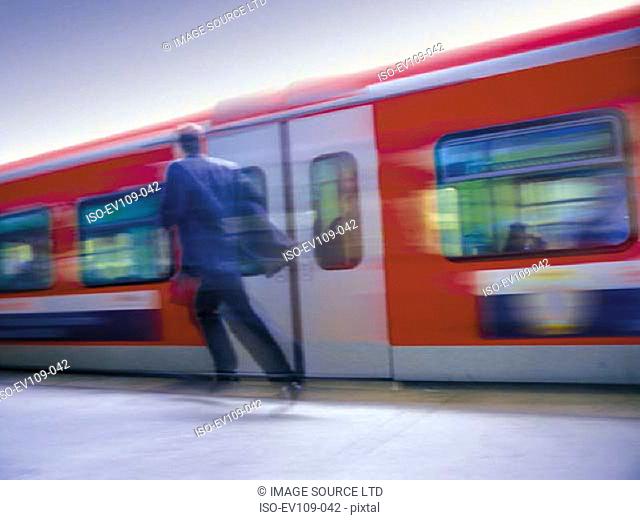 Man running after train