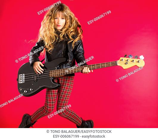 Blond Rock and roll girl playing bass guitar on red background