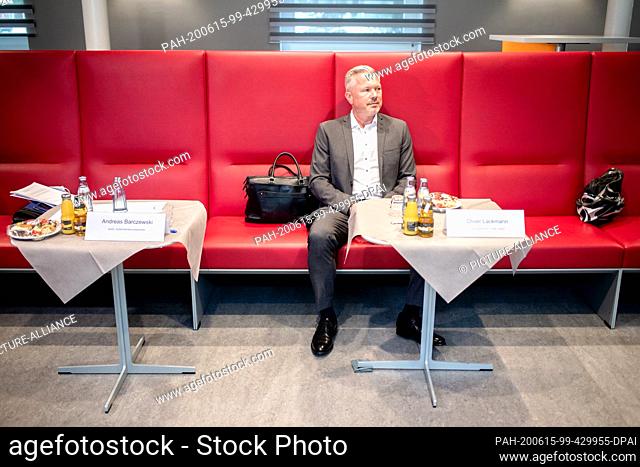 15 June 2020, Lower Saxony, Hanover: Oliver Lackmann, Managing Director of TUIfly GmbH, sits on a red bench before beginning a meeting with the Lower Saxony...