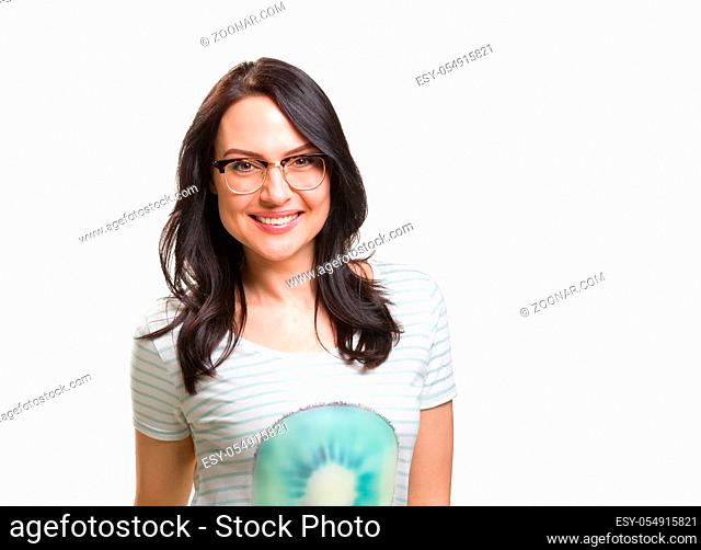 Portrait of a young fashionable woman in a eyeglasses, isolated on white background