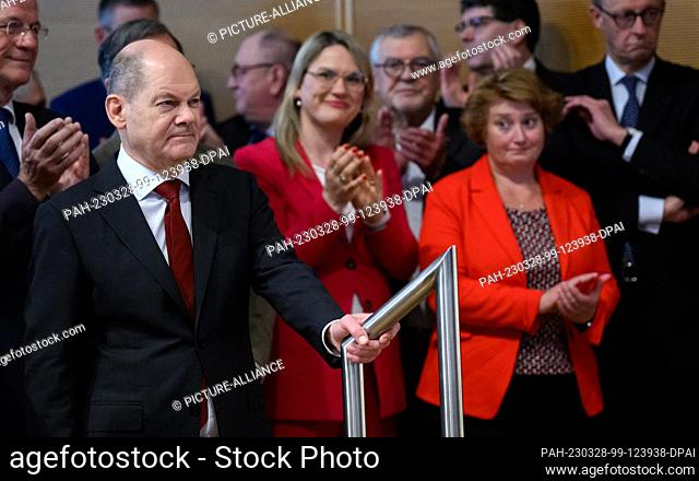 28 March 2023, Berlin: Chancellor Olaf Scholz (SPD) stands at the annual reception of the Federation of Expellees (BdV) at the Catholic Academy