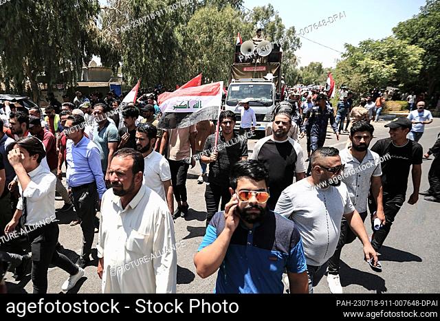18 July 2023, Iraq, Baghdad: People take part in a protest near the Turkish Embassy in Baghdad, against the shortage of the water supply of Euphrates and Tigris...