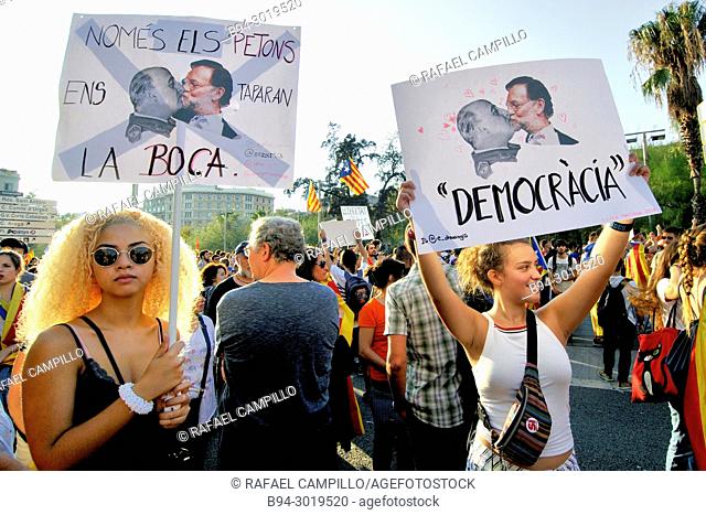 Political demonstration for the independence of Catalonia. Posters with image of dictator Franco and prime minister Mariano Rajoy kissing