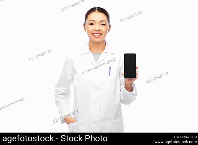 happy asian female doctor or nurse with smartphone