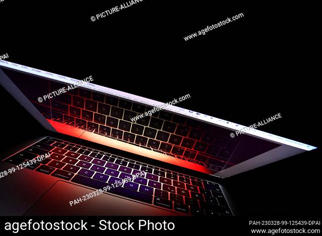 28 March 2023, Bavaria, Kempten: ILLUSTRATION - The keyboard of a laptop is reflected in its screen. Photo: Karl-Josef Hildenbrand/dpa