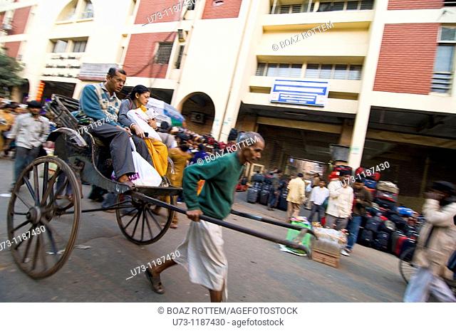 Man pulled rickshaws are still widely used in Kolkata, India