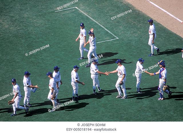 Overhead view of baseball players greeting each other on diamond, Dodger Stadium, Los Angeles, CA