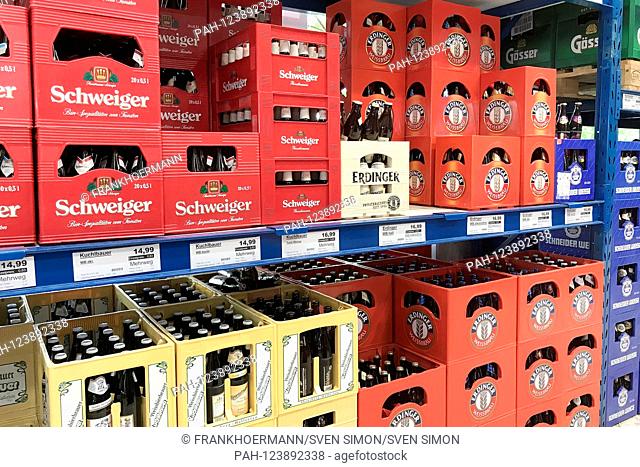 stacked full beer crates in a drinks market.Erdinger Weissbier, Schweiger, | usage worldwide. - Munich/Bayern/Deutschland