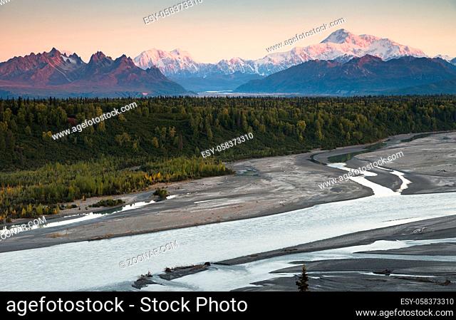 The last suunlight hits the tip top of The Denali Range and Mt McKinley Chulitna River