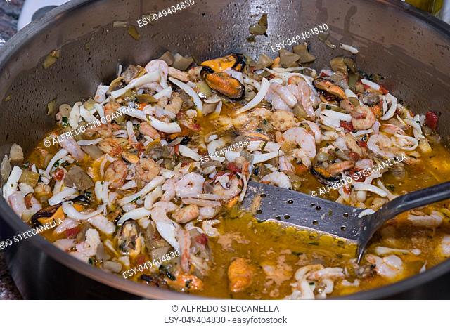 A big pot of traditional Sicilian seafood with delicious mussels