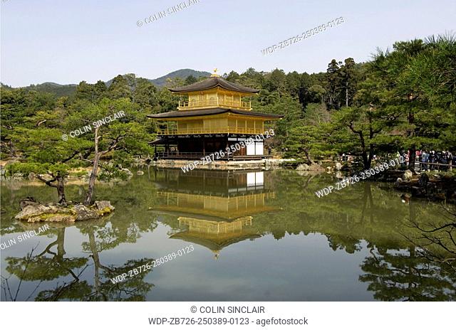 Kinkakuji, The Golden Pavilion, Rokuen ji Temple, Kyoto, Japan, View across pond and islets, Early morning, Springtime, Horizontal