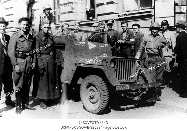 World War 2. US soldiers with Czechoslovakian resistance fighters liberated Pribram in Western Bohemia(?). 1945