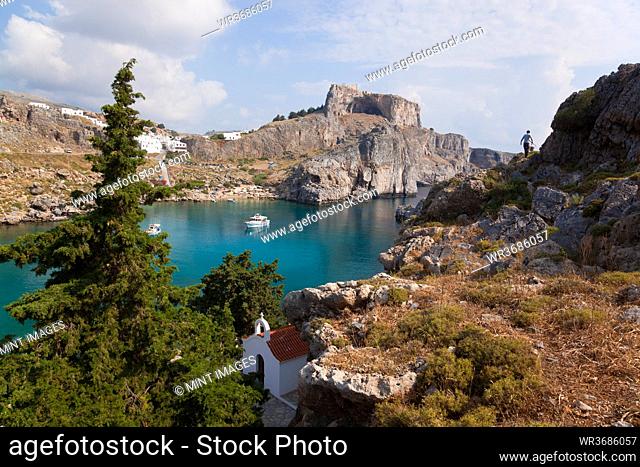 St Pauls Harbour, beach and Acropolis, Lindos Rhodes Greece
