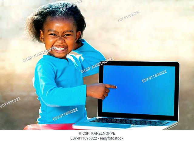 Funny african girl pointing at blank screen, Stock Photo, Picture And Low  Budget Royalty Free Image. Pic. ESY-011696322 | agefotostock