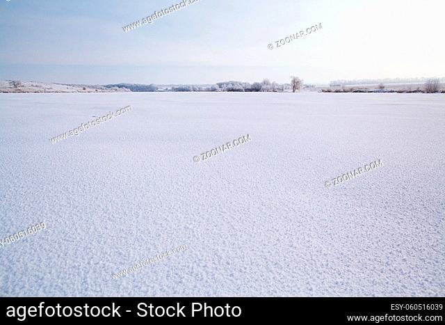 winter lake view with snow. frozen lake with winter snow. winter wonderland