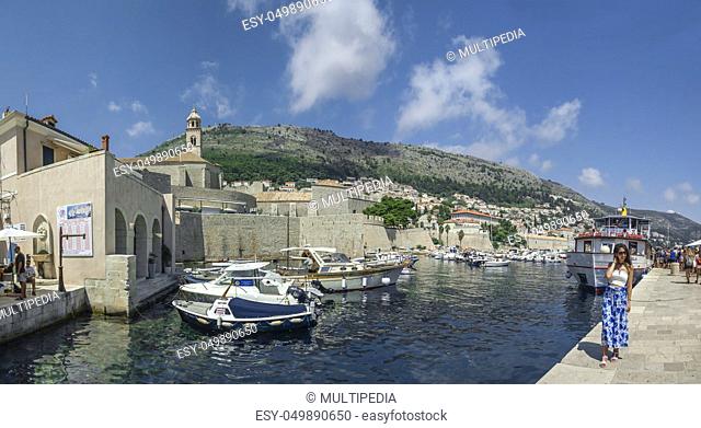 Dubrovnik, Croatia - 07. 13. 2018. Panoramic view of the Old Town and Old Port of Dubrovnik, Croatia, in a sunny summer day