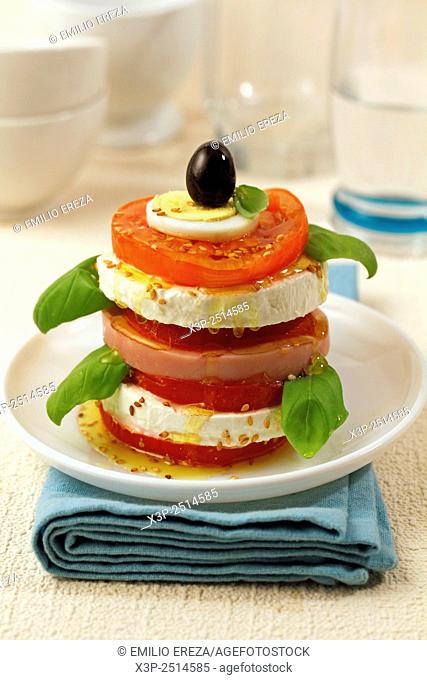 Tomato, cheese and ham tower