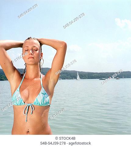 Young Woman wearing a Bikini half-portrait