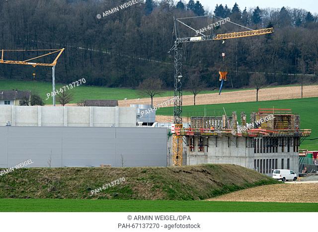 Construction cranes standing on the grounds of the poultry slaughter facility of Wiesenhof in Bogen, Germany, 1 April 2016