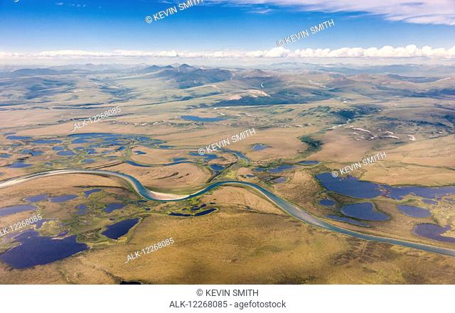 Aerial view of the Kobuk River with the Baird Mountains visible in the background, Arctic Alaska, summer