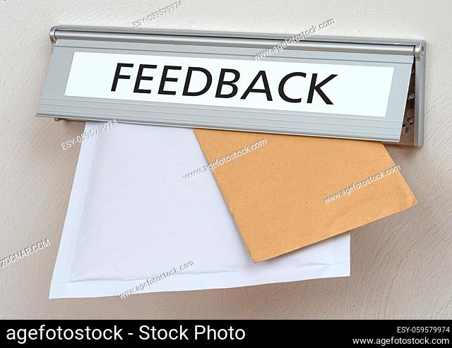 A letterbox with the label Feedback