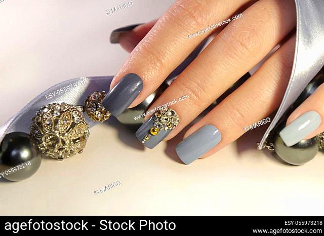 Beautiful nails, hand with sleeve and lettering nail day. Illustration for  background, beauty salon and nails artist. Image can be used for greeting  card, poster. Isolated on white background. 15645803 Vector Art