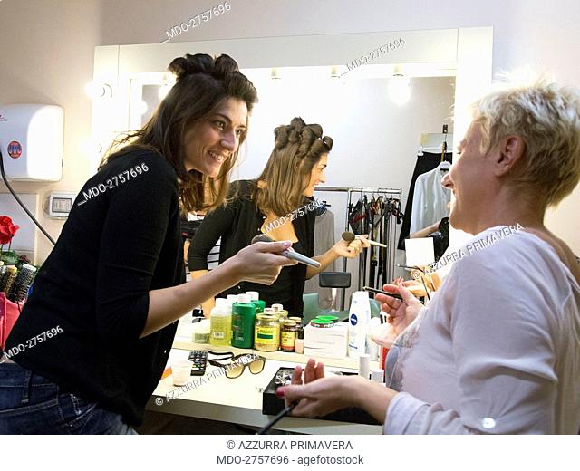 Backstage of the Raiuno TV show 'A conti fatti' with Italian TV host Elisa Isoardi talking to her make-up artist Roberta Canali in her dressing room