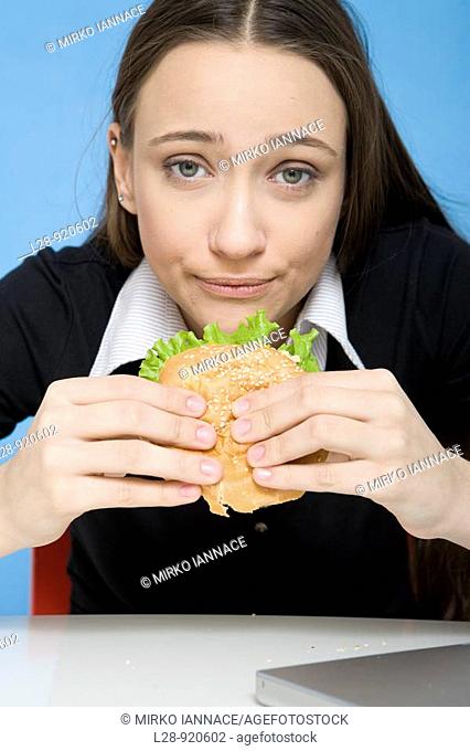 Woman Eating Sandwich