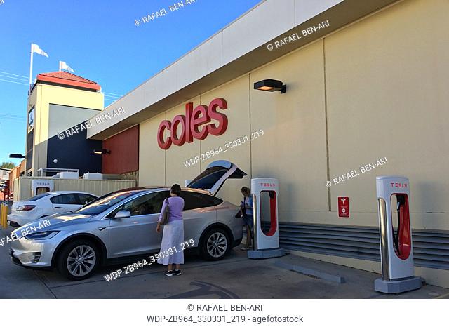 MELBOURN - MAR 01 2019:Tesla plug-in electric car Model X been charged by a Supercharger network in Coles Supercharger station