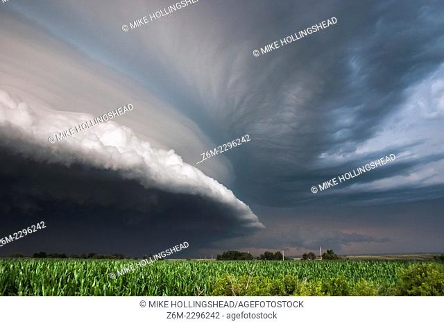 Slow moving tornadic supercell speeds up and gusts out as a fast moving shelf cloud July 12, 2004 near Bartlett Nebraska