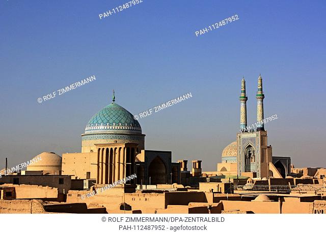 Iran - Yazd, also Jasd, is one of the oldest cities of Iran and capital of the province of the same name. View over the roofs of the old city with the mosque...