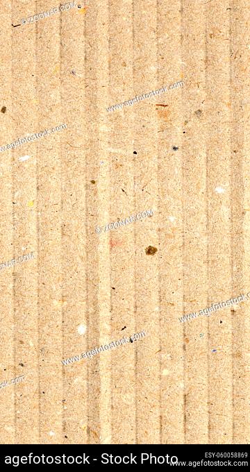 Brown corrugated cardboard useful as a background - vertical