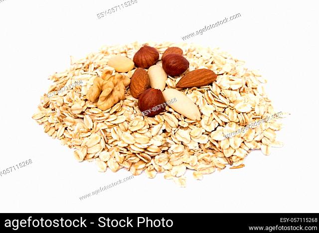 Mix nuts, raisins and oatmeal isolated on white background