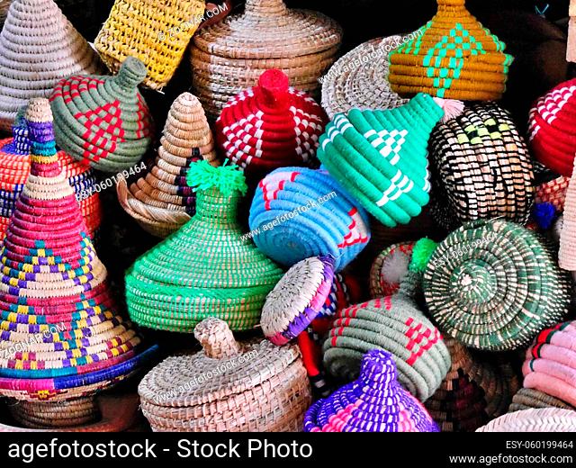 Selection of colourful wicker baskets on sale, Essaouira, Morocco. High quality photo