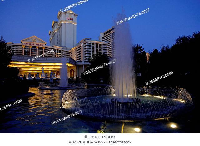LAS VEGAS - NV, Caesars Palace hotel and casino at dusk with fountain